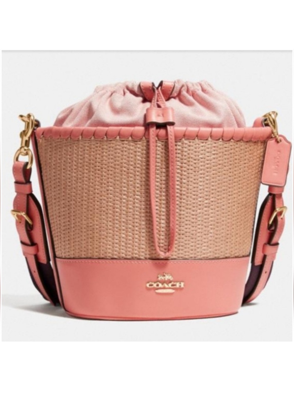 Coach woven straw bucket bag light coral leather